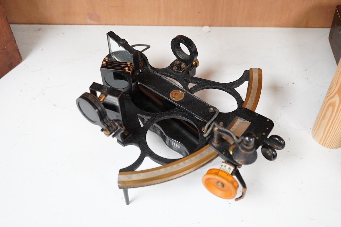 An early 20th century H. Hughes & Son Ltd. London, ‘Husun’ mahogany cased sextant, with engraved maker to the scale, also engrave serial number 29221, and with a battery pack for illuminating the scale, plaque to the ins